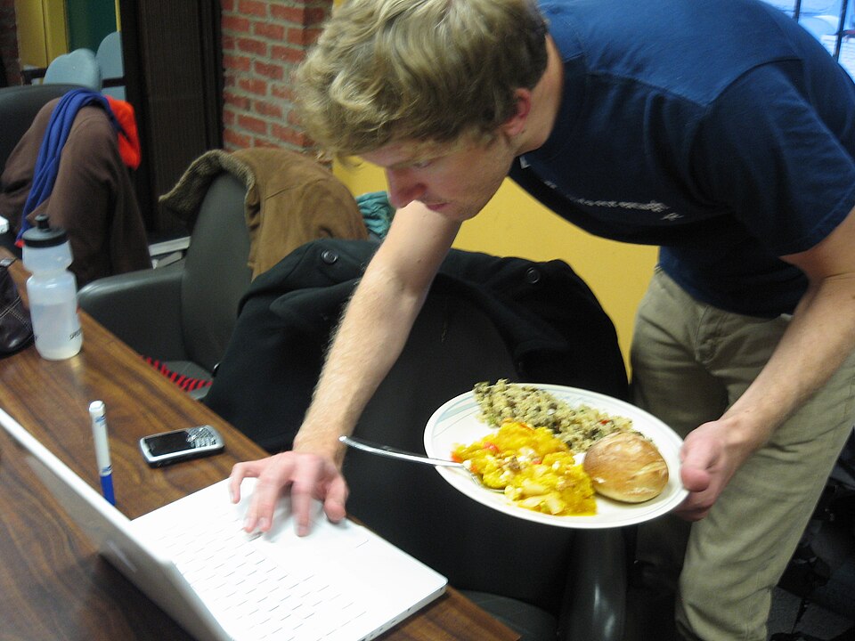A familiar physical action and reading can be combined differently from two demanding mental tasks. The photograph does not show the person’s performance on any test.